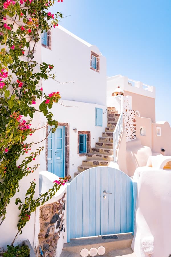 Mykonos whitewashed Chora with windmills and blue Aegean